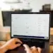 A laptop showing accounting statistics